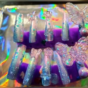 Glittery Blue  Nail Art With Beautiful Charms Set